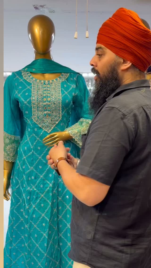 Original Instagram reel: a teal Anarkali presented in the showroom