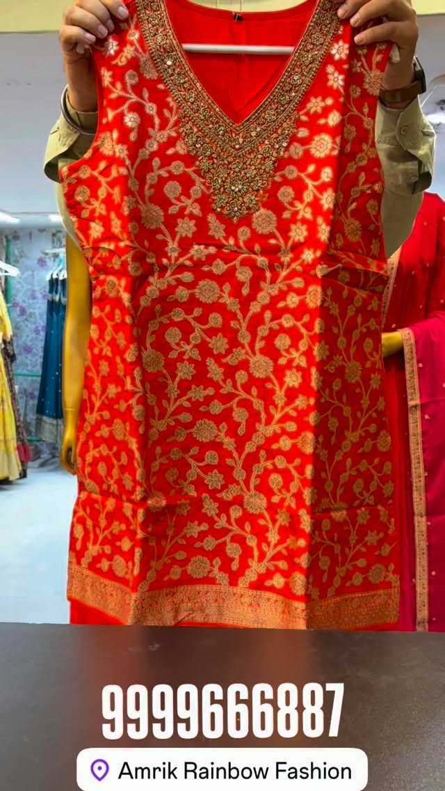 Original Instagram reel: red and gold festive suit